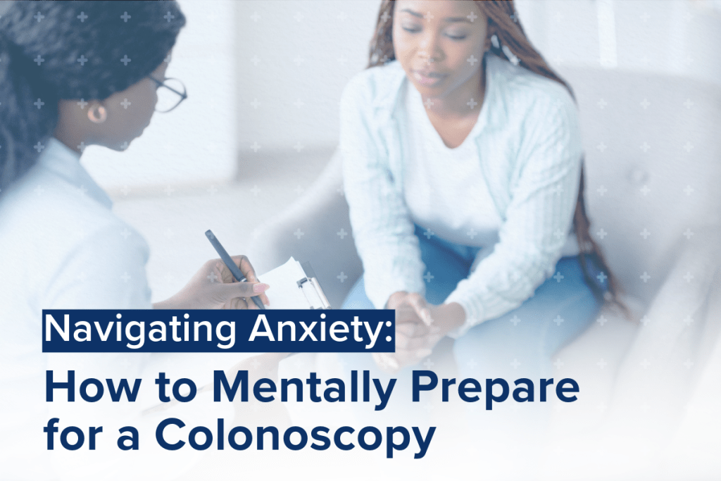 A doctor holding a clipboard and pen speaks with a patient who appears anxious, illustrating the topic "Navigating Anxiety: How to Mentally Prepare for a Colonoscopy."