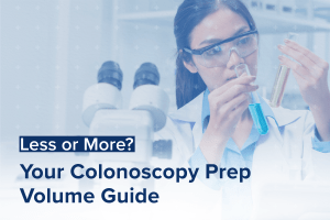 A scientist in a lab coat and goggles examines test tubes beside a microscope, pondering: Colonoscopy Prep Volume Guide: Less or More?.