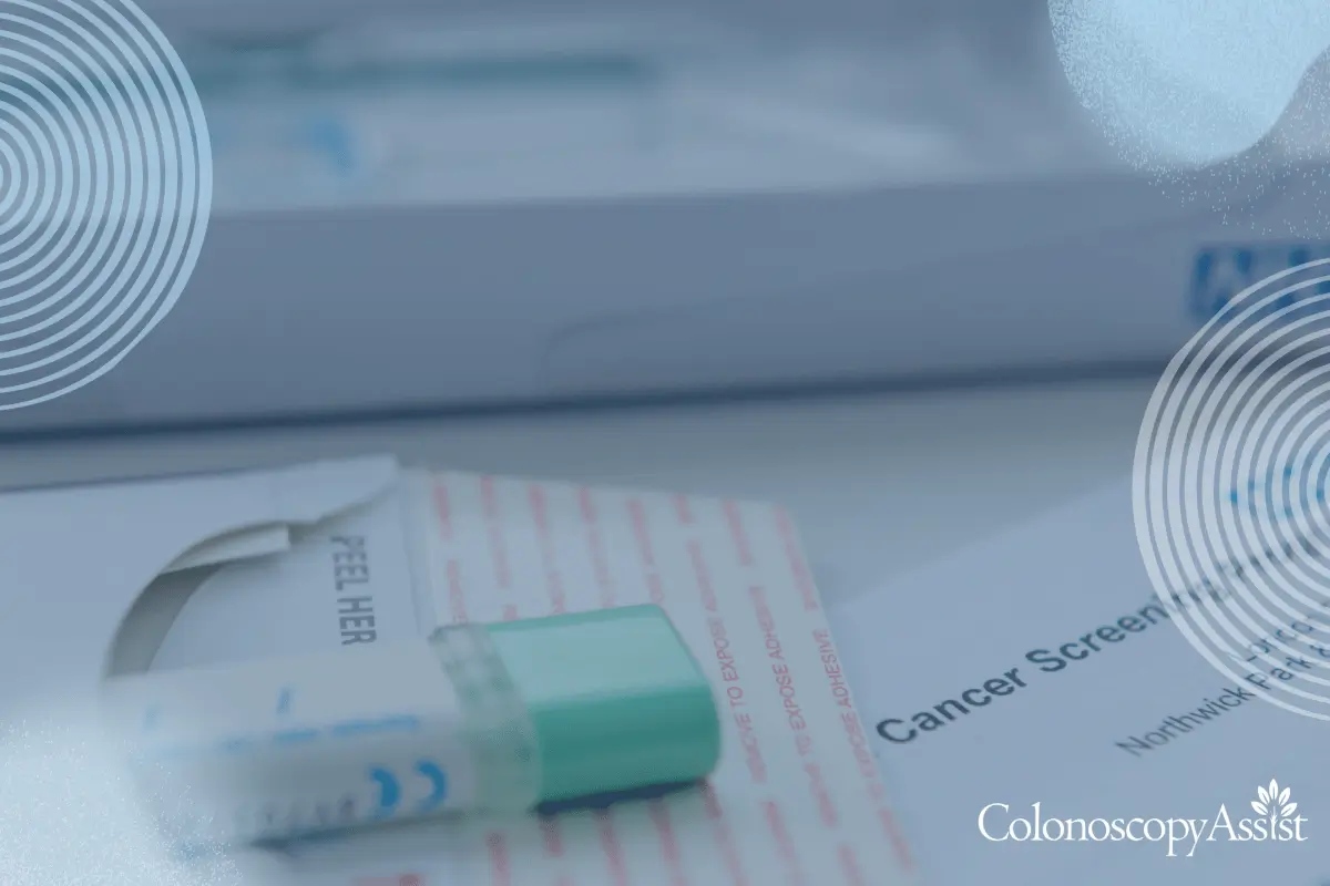 Close-up of a colorectal cancer screening test kit, featuring a sample collection tube and an instruction booklet.