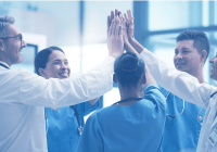 A group of healthcare professionals in scrubs and lab coats stand together, smiling and giving a group high-five indoors, celebrating a successful colonoscopy. A group of healthcare professionals in scrubs and lab coats stand together, smiling and giving a group high-five indoors, celebrating a successful colonoscopy.